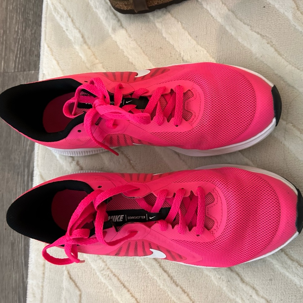 Sonic pink Nike running shoes